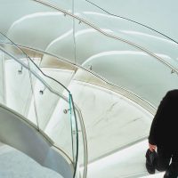 Tiffany & Co - Curved Staircase glass railings