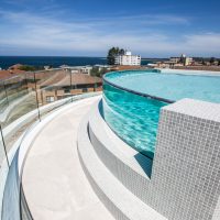 Soul-Apartments Curved Balustrades & Pool Glass